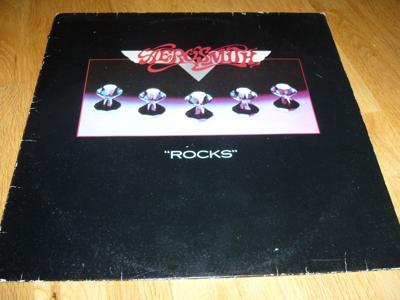 Tumnagel för auktion "Aerosmith Rocks LP 1976 First Dutch Pressing Textured Sleeve Rare!!"