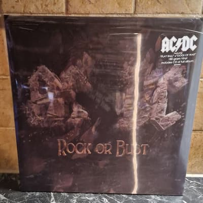 Tumnagel för auktion "AC/DC-Rock or bust"