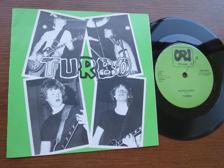 Tumnagel för auktion "TURBO - NATTENS BARN/ASFALTSROCK ORI REC. RARE PUNK -80"