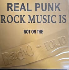 Tumnagel för auktion "Real Punk Rock Music Is Not On The Radio - Vol. 10"