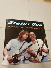 Tumnagel för auktion "Status Quo - Rock 'Til You Drop HOL-91"