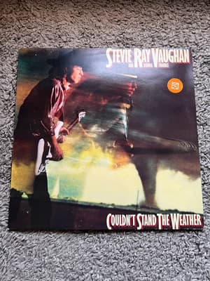 Tumnagel för auktion "Stevie Ray Vaughan & Double Trouble - Couldn't Stand the Weather vinyl från 1984"