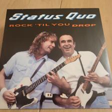 Tumnagel för auktion "LP-skiva med Status Quo - Rock 'Til You Drop"