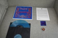 Tumnagel för auktion "The Hellacopters – Grande Rock imited Edition, Clear Blue Marbled 400 st"