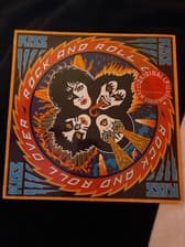 Tumnagel för auktion "Kiss Rock And Roll Over LP"