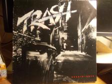 Tumnagel för auktion "Trash – Burnin' Rock"