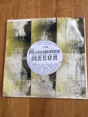 Tumnagel för auktion "Manchester Mekon: No Forgetting 7” DIY Rare"
