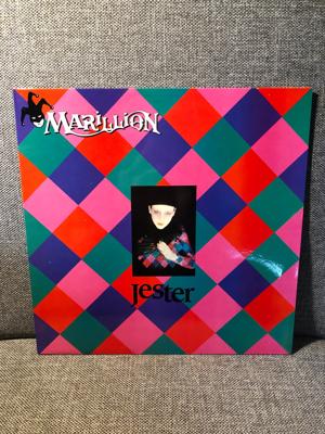 Tumnagel för auktion "Marillion - Jester (Avon Records, 1983) LP i fint skick."