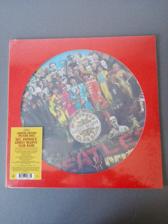 Tumnagel för auktion "The Beatles Sgt. Peppers lonely hearts club band. Picture disc. Limiterad."