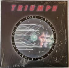 Tumnagel för auktion "TRIUMPH rock n roll machine LP -77 Can ATTIC LAT 1036"