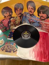 Tumnagel för auktion "Beatles  Sgt. Pepper’s Lonely  Hearts Club Band. PCS 7027."