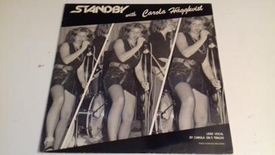 Tumnagel för auktion "STANDBY with CAROLA HÄGGKVIST - LP - Röd vinyl - ROSA HONUNG RECORDS - 1983/84"