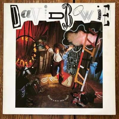 Tumnagel för auktion "David Bowie - Never Let Me Down - vinyl album 1987"