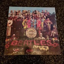 Tumnagel för auktion "Beatles The Beatles sgt Pepper's lonely heart's club band vinyl LP vg+"