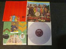 Tumnagel för auktion "The Beatles - Sgt peppers lonely hearts club band grey/pink vinyl"