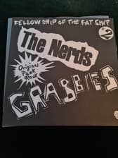 Tumnagel för auktion "The Nerds/Grabbies/Pricks/Idyls - Fellow ship.. (Ken Rock 2000) SWE 7" VG+/VG+"