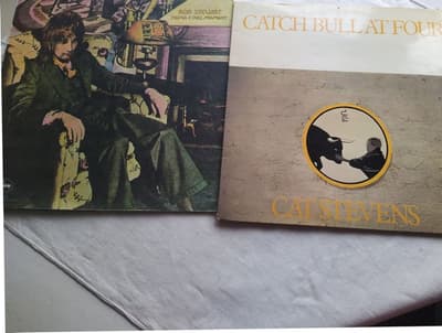 Tumnagel för auktion "LP CAT STEVENS-Catch Bull at Four/Rod Stewart-Never a Dull Moment"
