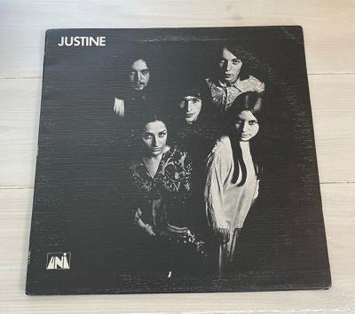 Tumnagel för auktion "Justine LP UK Uni Records"