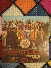 Tumnagel för auktion "
The Beatles – Sgt. Pepper's Lonely Hearts Club Band 1967"