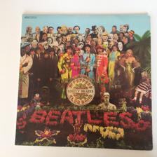 Tumnagel för auktion "The Beatles - Sgt. Pepper's Lonely Hearts Club Band"