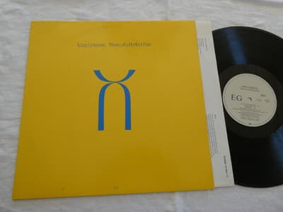 Tumnagel för auktion "King Crimson Three Of A Perfect Pair Polydor 817 882-1 1984"
