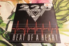 Tumnagel för auktion "220 VOLT - SINGEL - "BEAT OF A HEART" - 1988 - HÅRDROCK!!!"