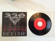 Tumnagel för auktion "220 volt - Beat of a heart 7&quot; vinylsingel"