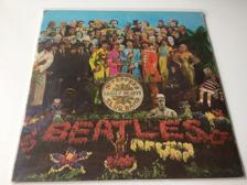 Tumnagel för auktion "The Beatles - Sgt Peppers Lonely Hearts Club Band LP UK 1967 PCS 7027"